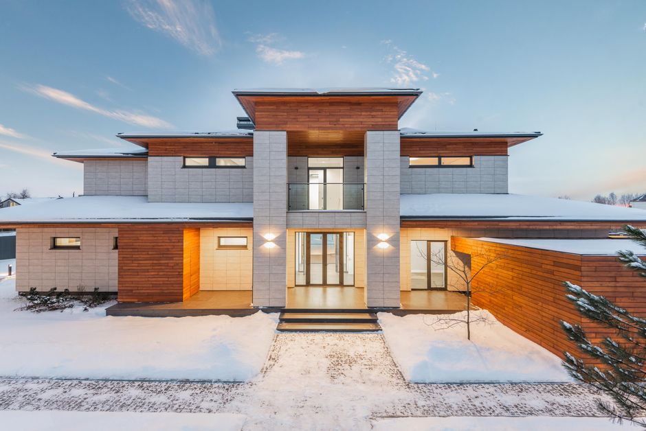 Luxurious cottage house with stone and wooden facade